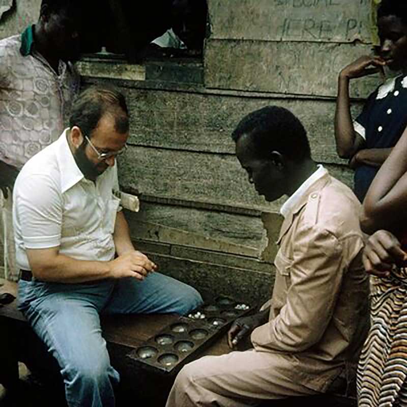 Keith plays Oware in Nima, Ghana